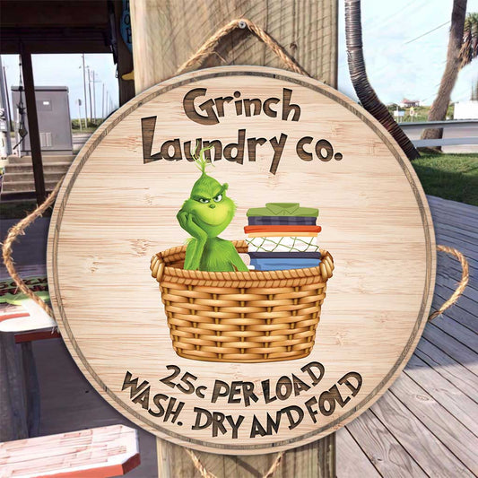 Laundry Co - Stole Christmas Round Wood Sign